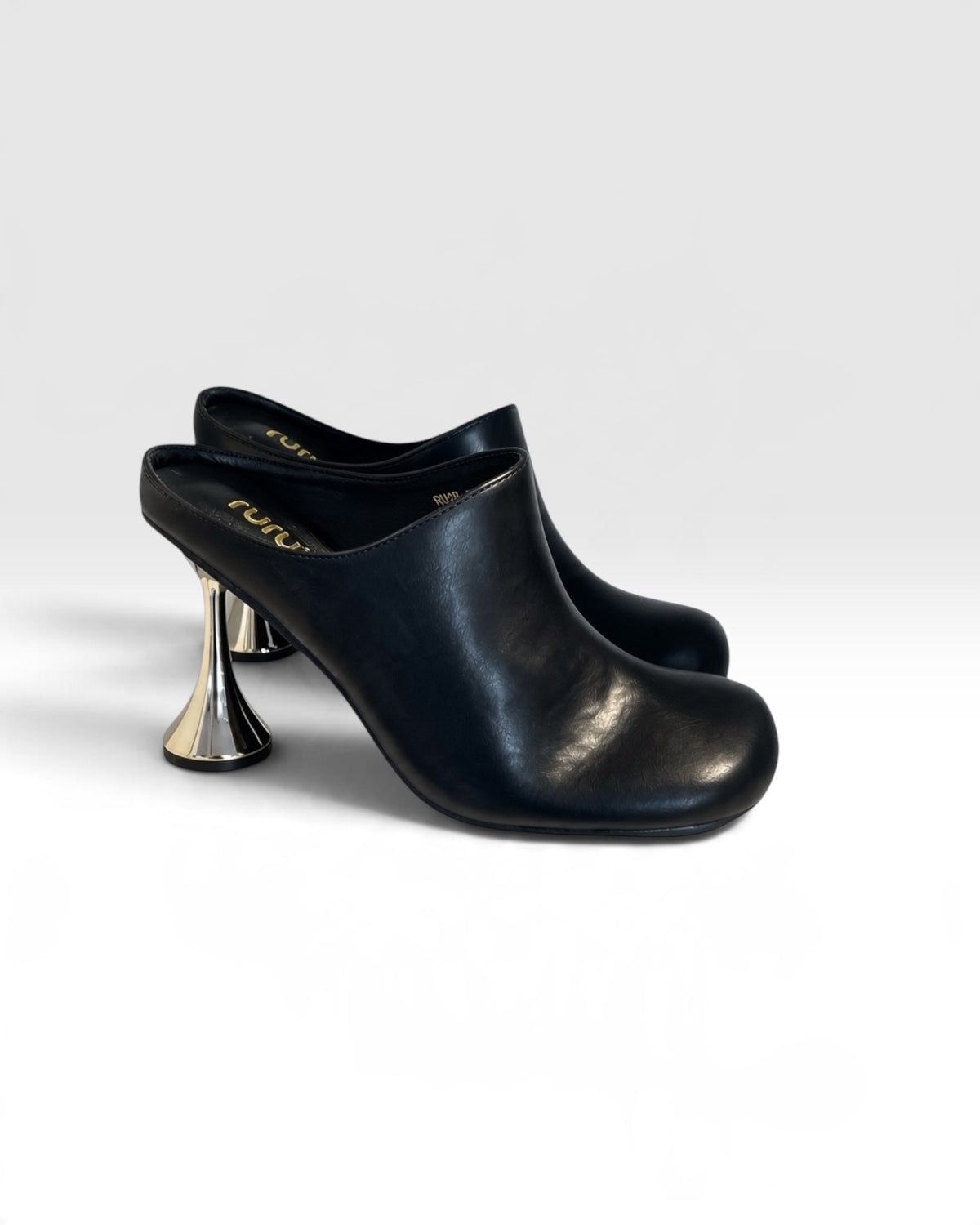Mules con tacco oro Nero