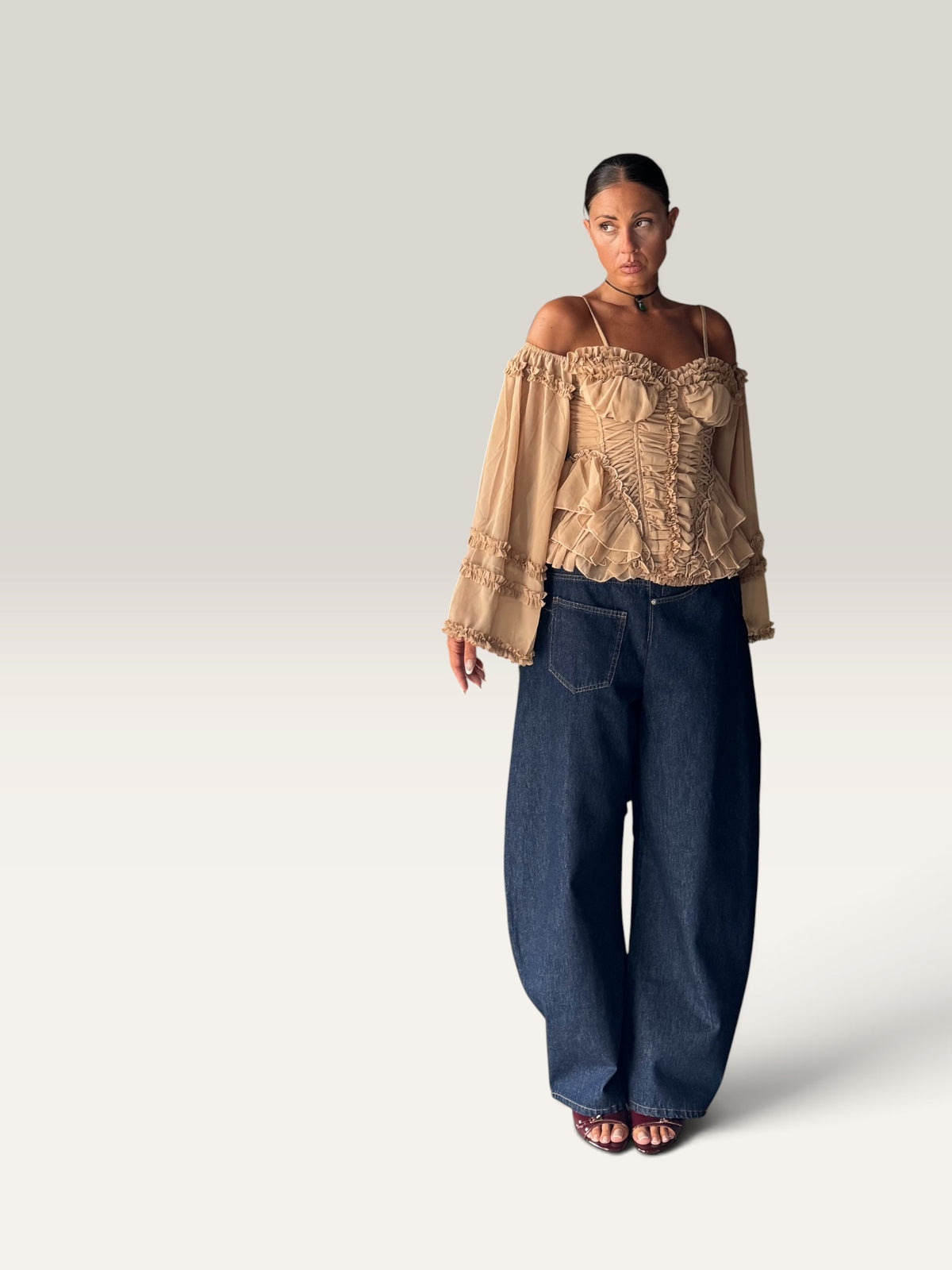 Top corsetto con manica
