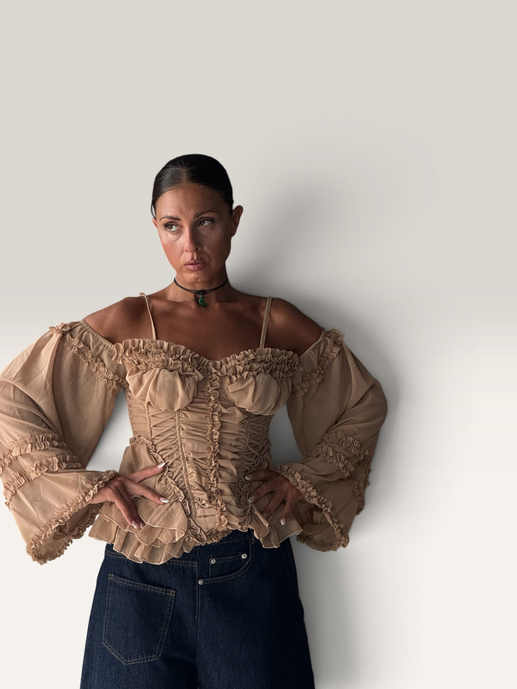Top corsetto con manica
