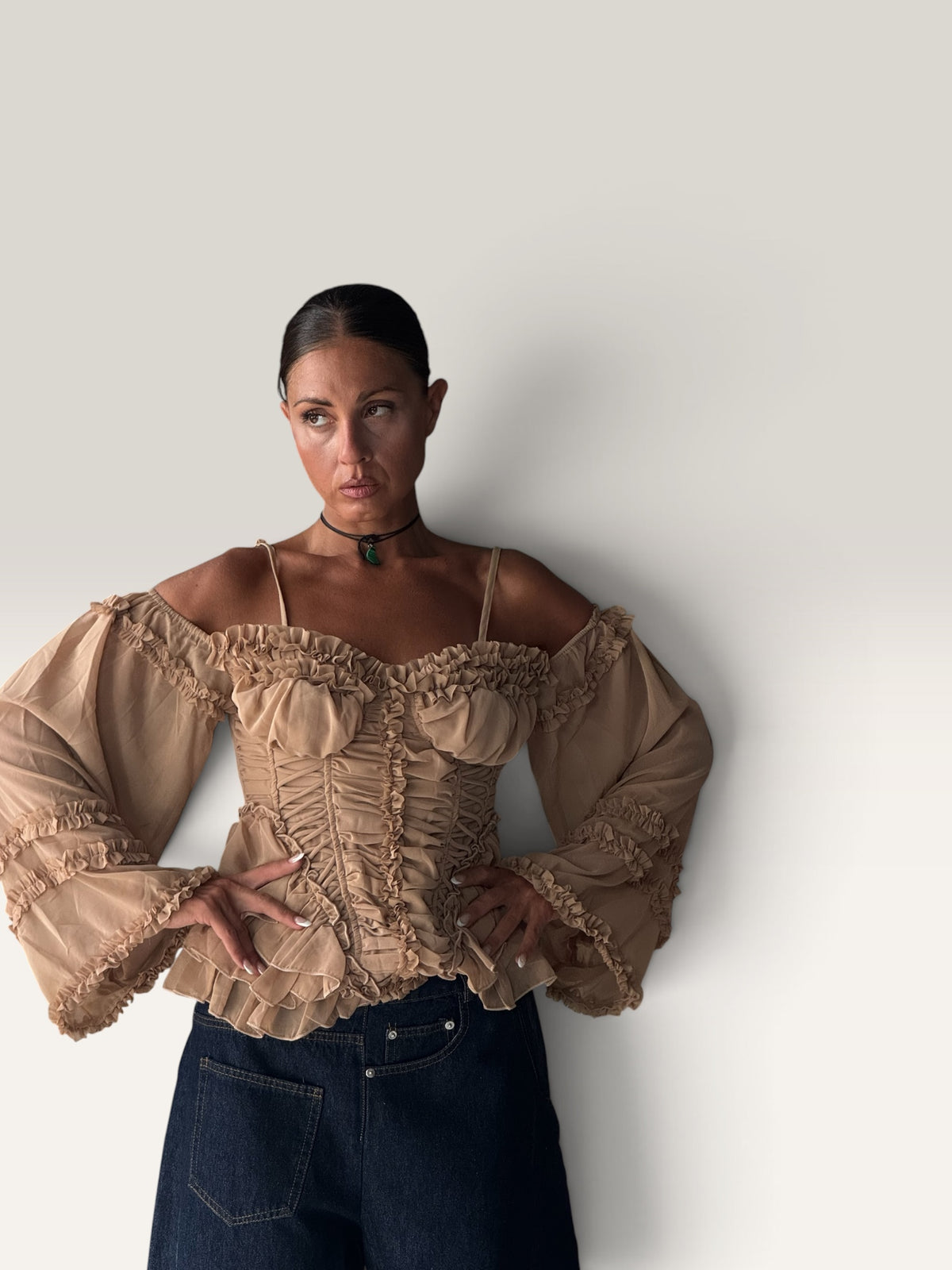 Top corsetto con manica