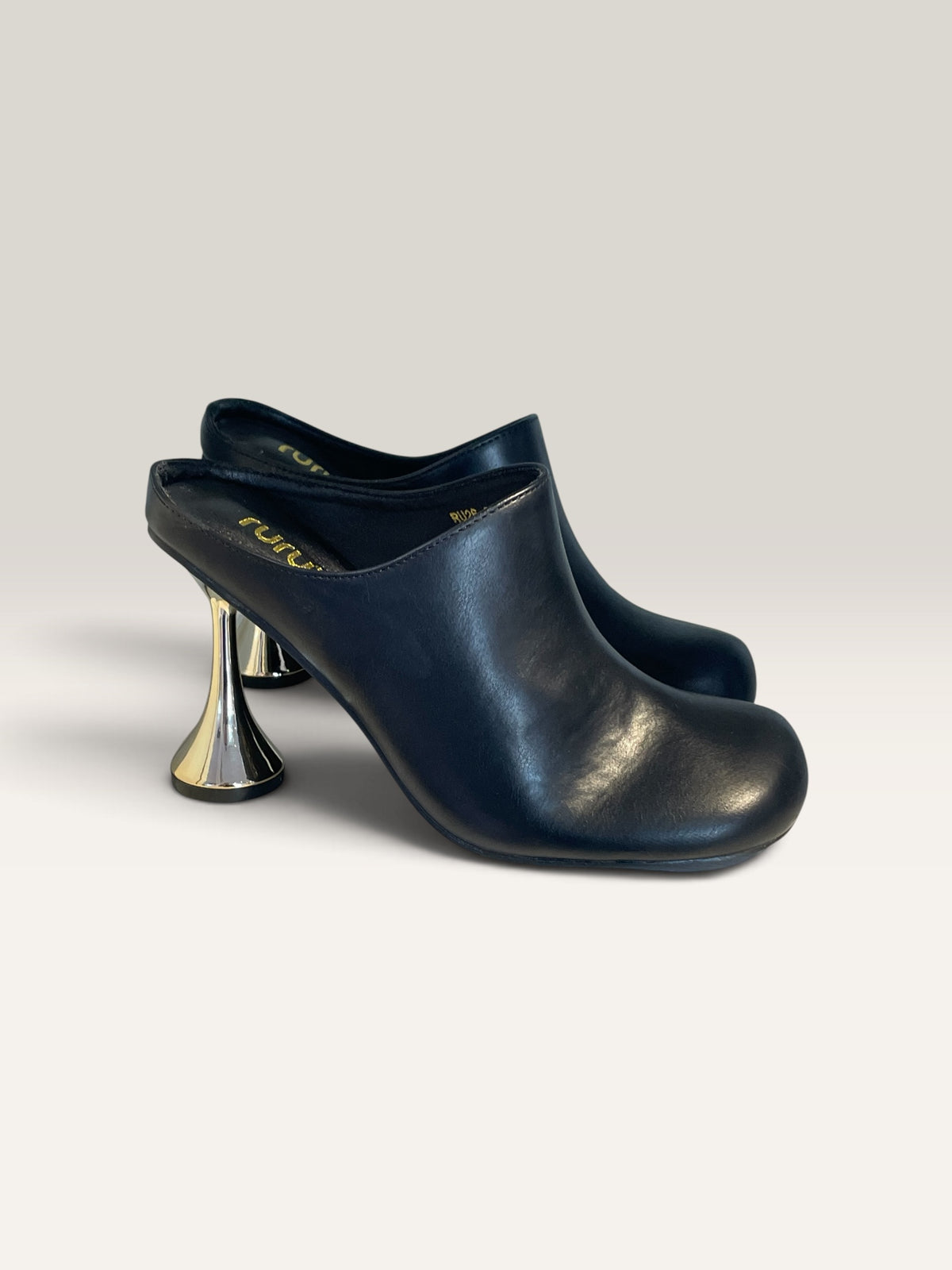 Mules con tacco oro Nero